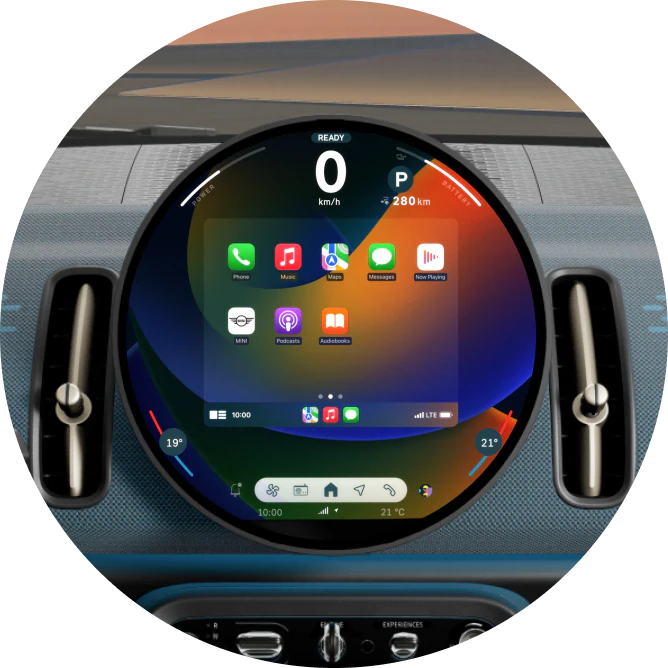 A close-up shot of the 9.4” round OLED display with an array of apps on the screen.